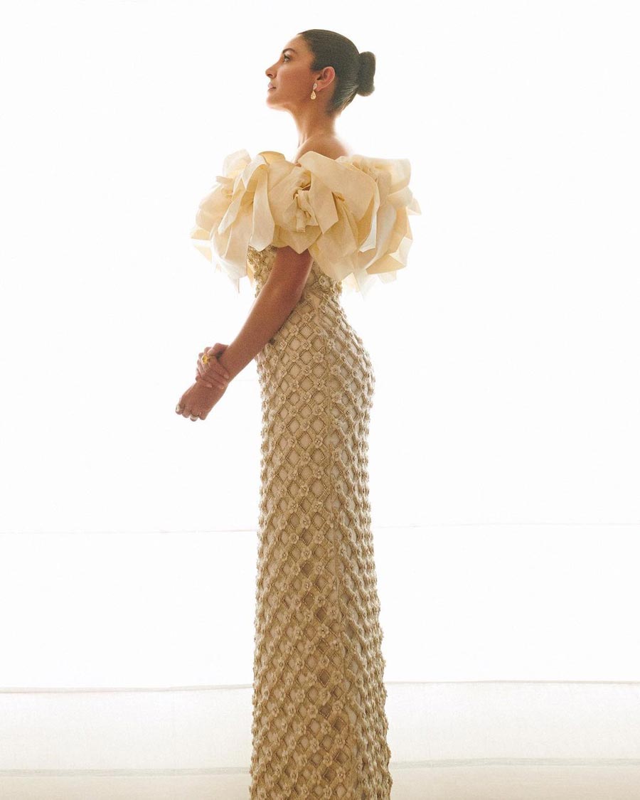 The off-the-shoulder dress featured a statement floral shoulder and a geometric pattern on the rest of the body. 