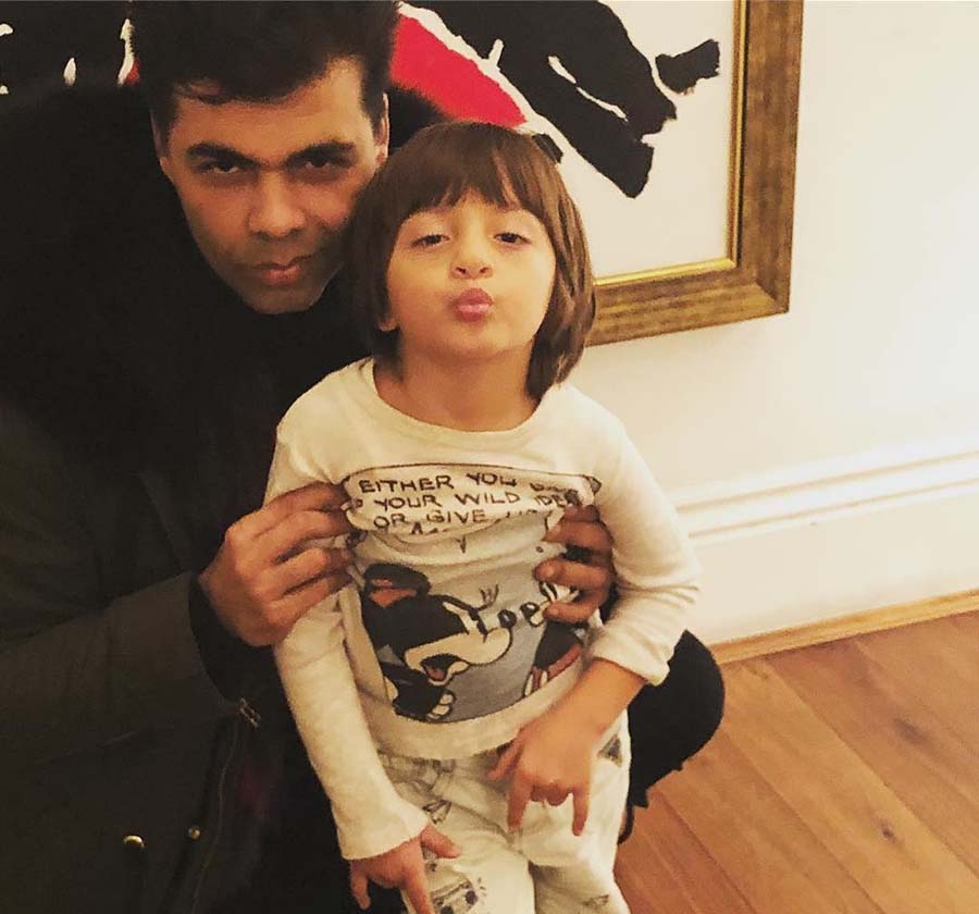 AbRam pouted before the camera as he shared the frame with filmmaker Karan Johar, a close family friend of the Khans.