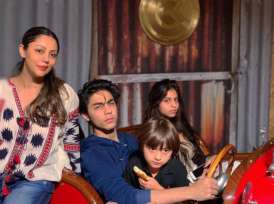 When the three siblings posed with their mum, AbRam decided to look away from the lens at the very last minute, creating a familiar moment for everyone who tried to click the photo of a kid.