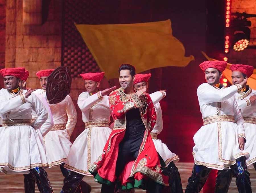 Varun Dhawan joined the party in a traditional red coat and black trousers, shaking a leg to The Punjaban song, Malhari, Garmi, Shava Shava and Naacho Naacho.