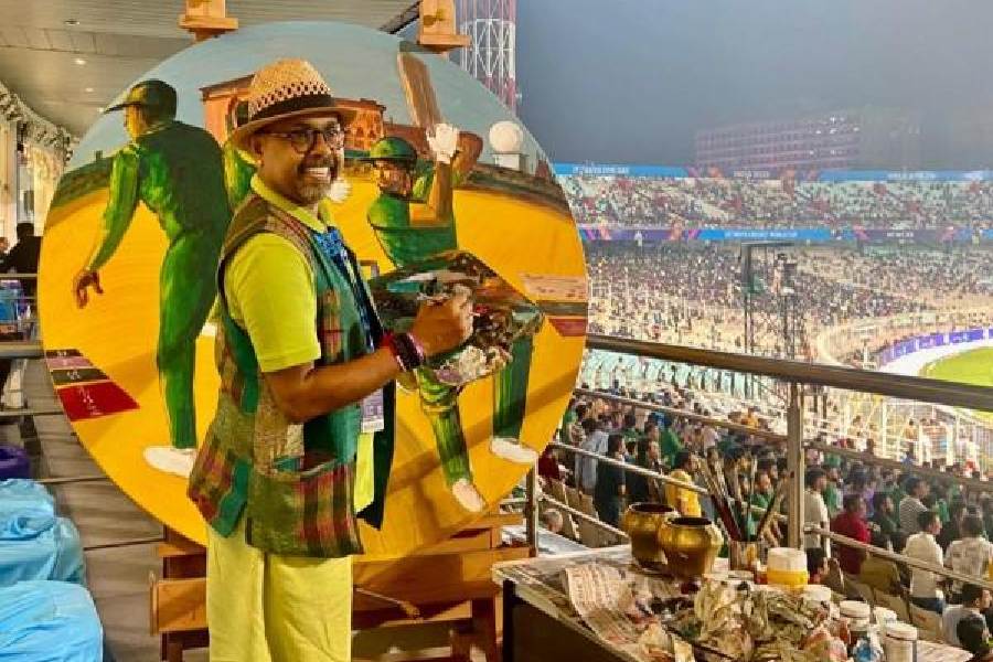 Artist Paresh Maity at work at the Eden Gardens during the Bangladesh-Pakistan match on Tuesday