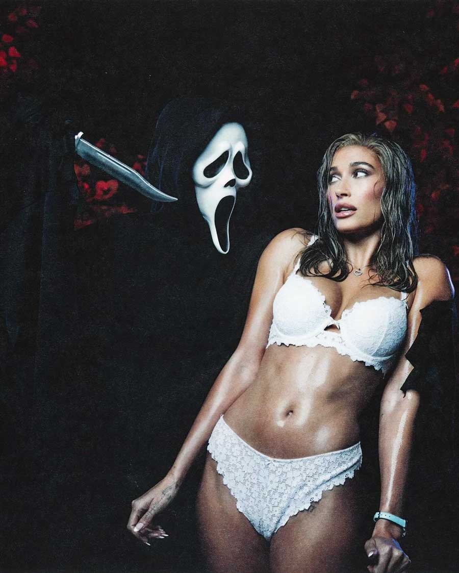 Hailey Beiber sported a white lacy lingerie set and posed with Ghostface from the Scream franchise pointing a knife at her.