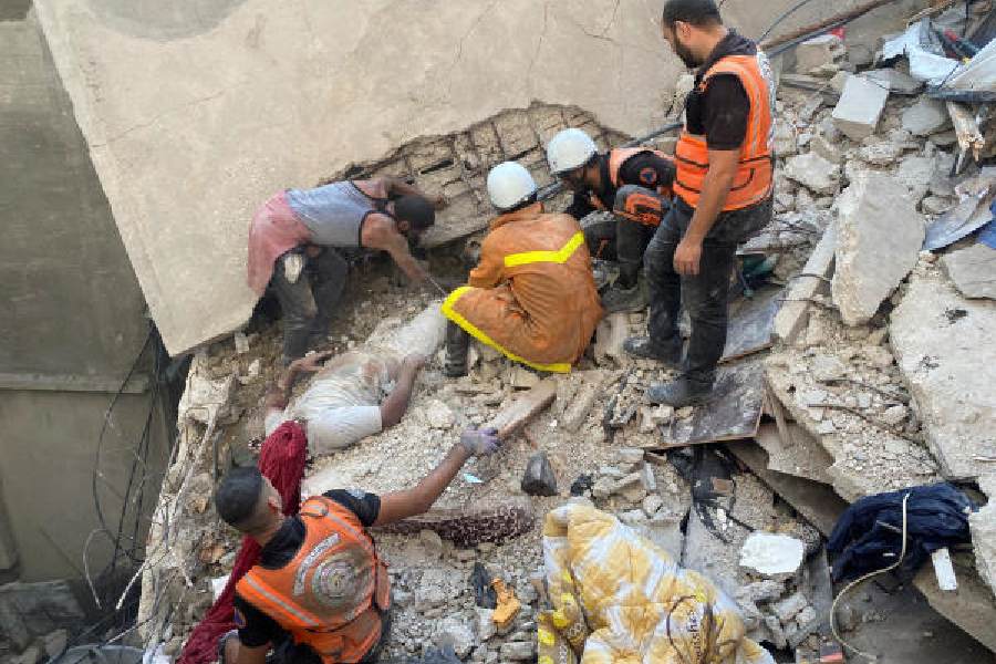 Israel-Palestine Conflict | Palestinian Rescuers At The Site Of ...