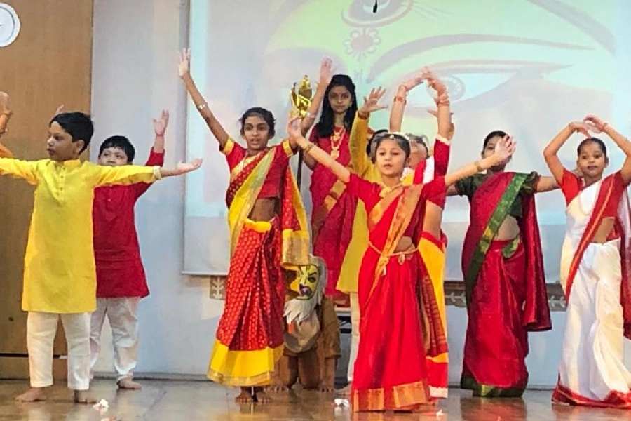Children ring in the festive flavour at Sri Sri Academy auditorium