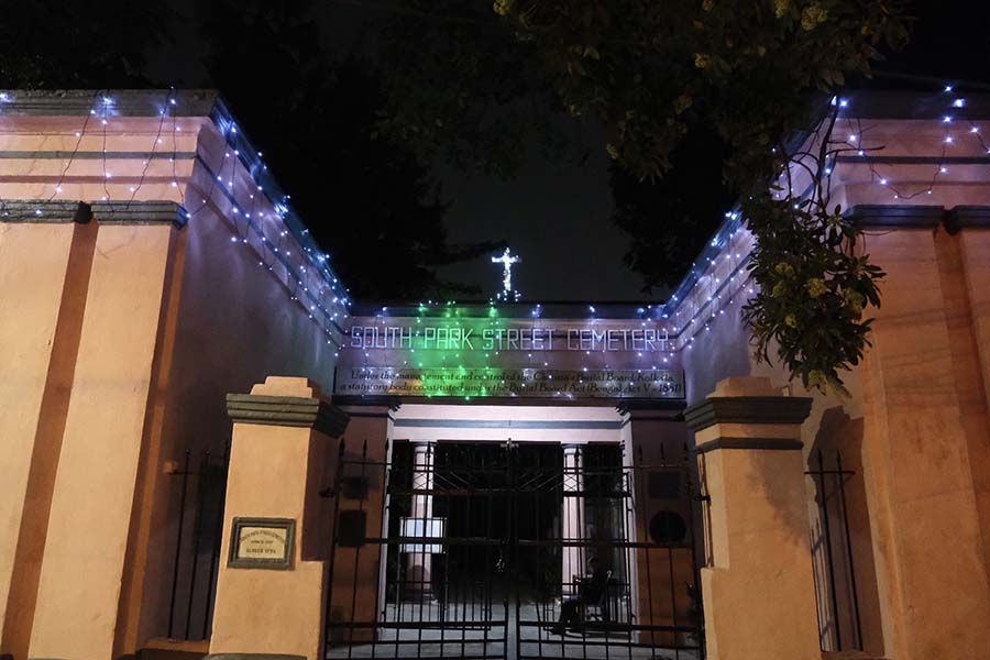 Colourful fairy lights adorn the entrance to the South Park Street Cemetery 