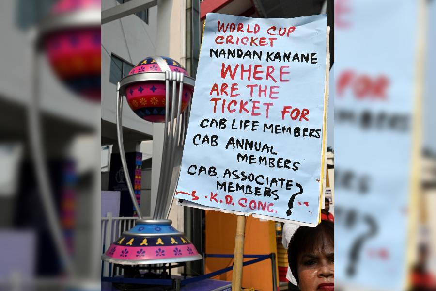 A protester holds a poster outside the Eden Gardens 1 on Friday alleging that members of the Cricket Association of Bengal had not received tickets for the India-South Africa match on Sunday.