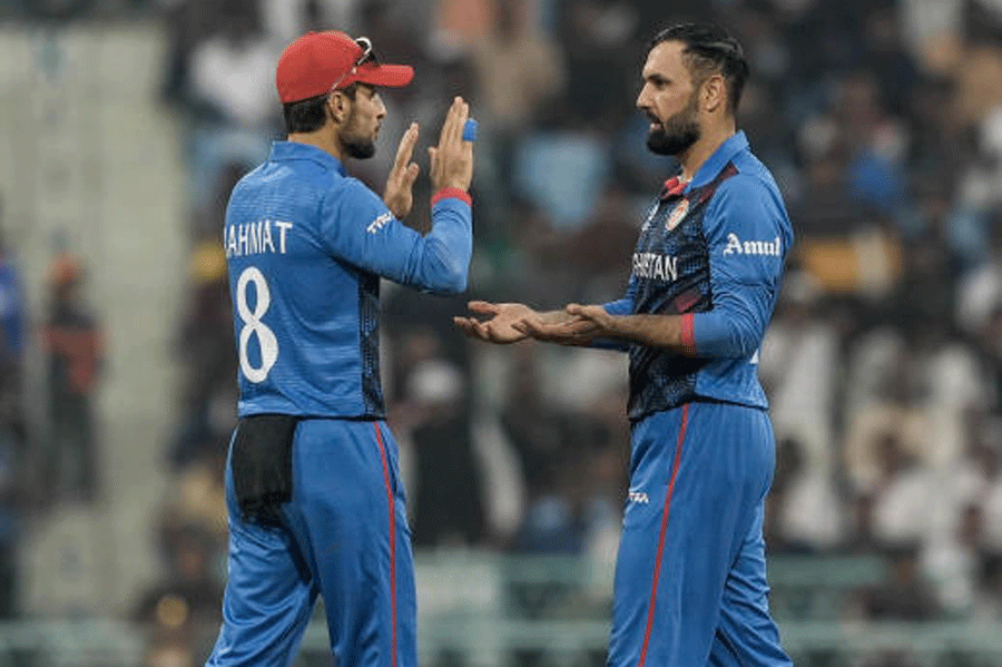 Man of the Match Mohammad Nabi (right) after dismissing Paul van Meekeren on Friday.