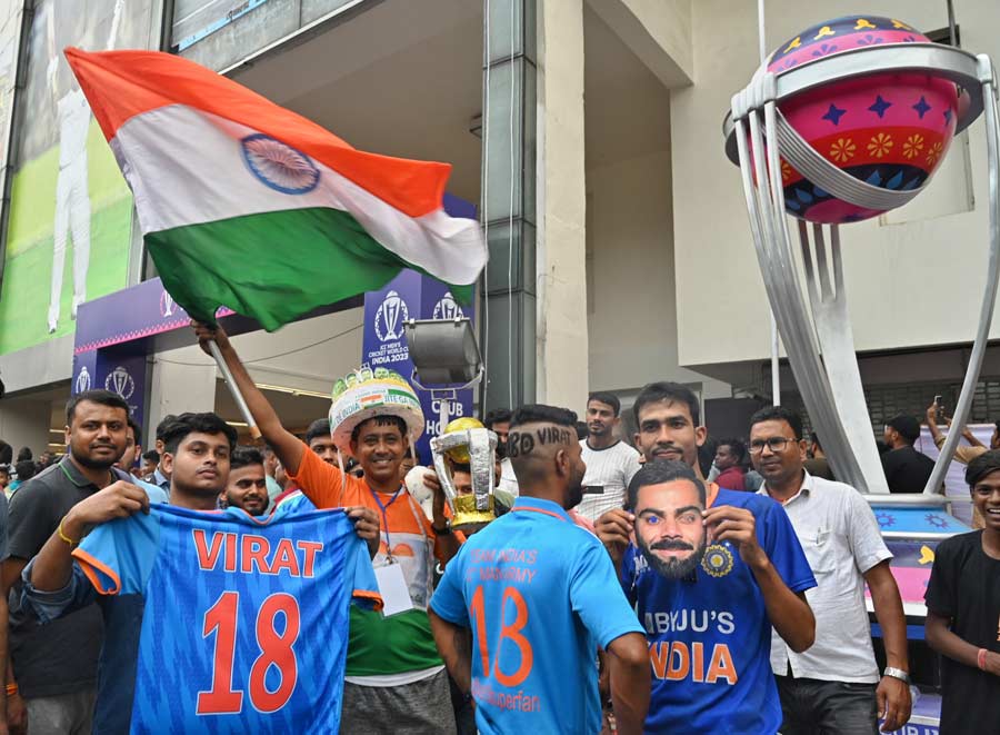 From waving the Tricolour to holding aloft replica of the 2023 ICC Men’s Cricket World Cup, huge crowds of crazy fans spent entire Saturday near Eden Gardens cheering Team India 
