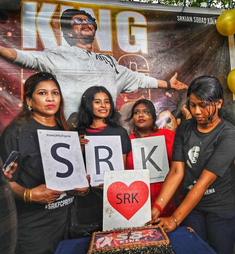 The SRKhan Squad Kolkata celebrated King Khan’s 58th birthday near Priya cinema on Thursday. Dressed in black tees and blue jeans, the fans held placards of the letters S, R and K and cut a huge chocolate cake with the numbers ‘5’ and ‘8’ in icing written on top  