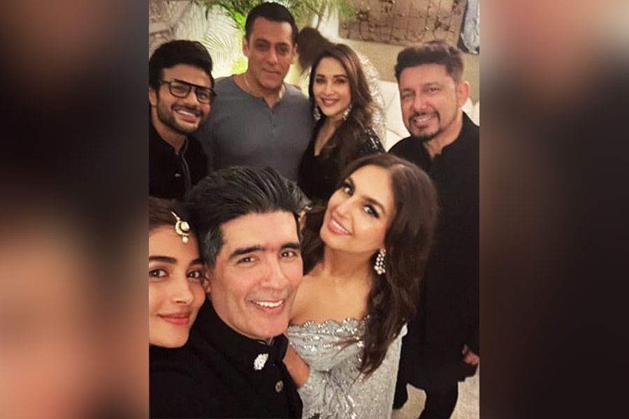 Manish Malhotra with guests at his pre-Diwali bash in Mumbai.