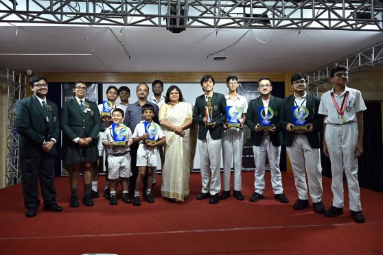 The budding quiz wizards along with Principal Mrs Joyoti Chaudhuri at the prize distribution ceremony.