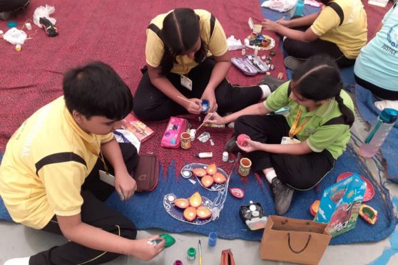 Young B.D.M.Ians enthusiastically participated in the diya painting session.