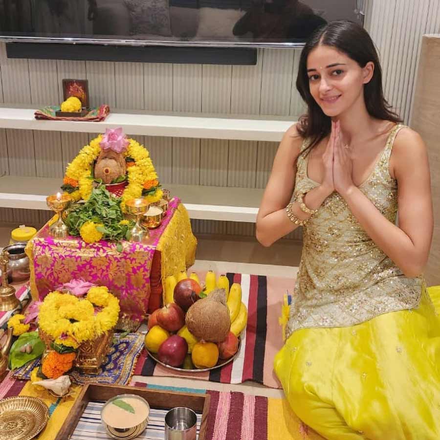 Ananya Panday bought a new house on the occasion of Dhanteras. The Dream Girl 2 actress sported a golden shimmering short kurti coupled with a yellow skirt and took part in a griha pravesh puja at her new residence.