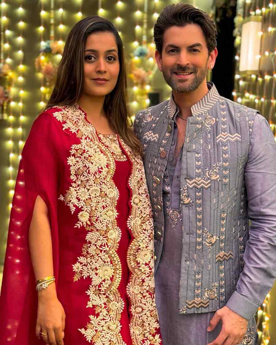 Neil Nitin Mukesh shared a picture with his wife Rukmini on Instagram. The 41-year-old actor sported a light violet kurta coupled with a matching printed coat, while Rukmini wore a red floral-embroidered anarkali. 