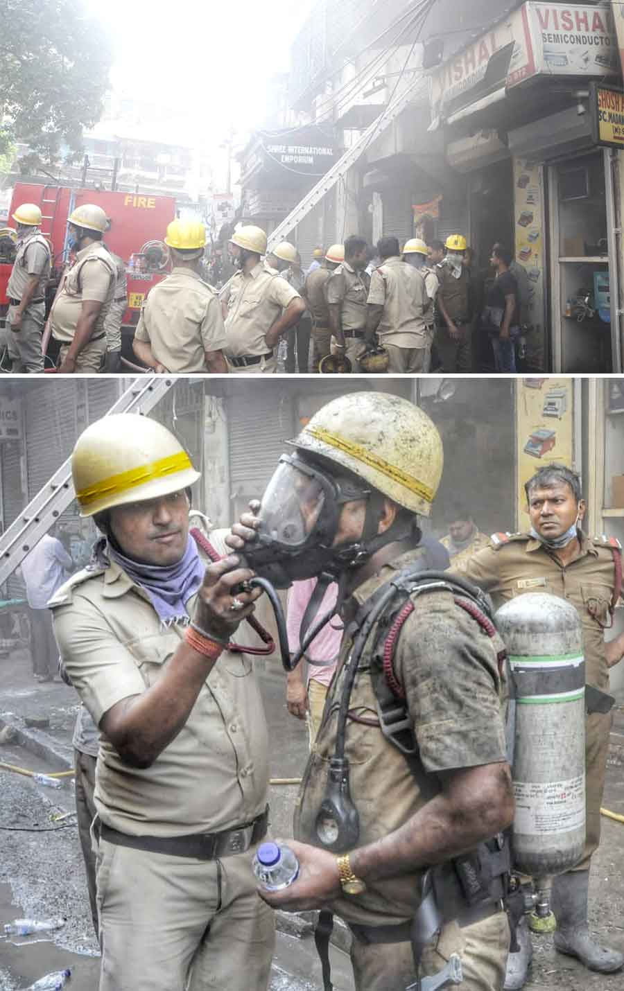Firemen fight a blaze at an electronics godown at Madan Street in Chandni Chowk on Saturday