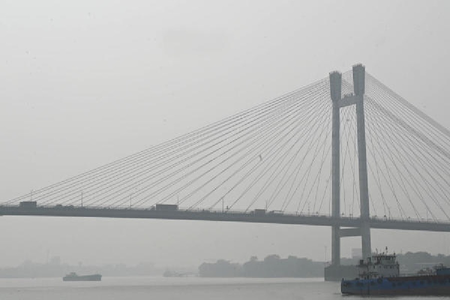 Haze over the Hooghly. Air pollution plays a role in preventing the daytime temperature from rising