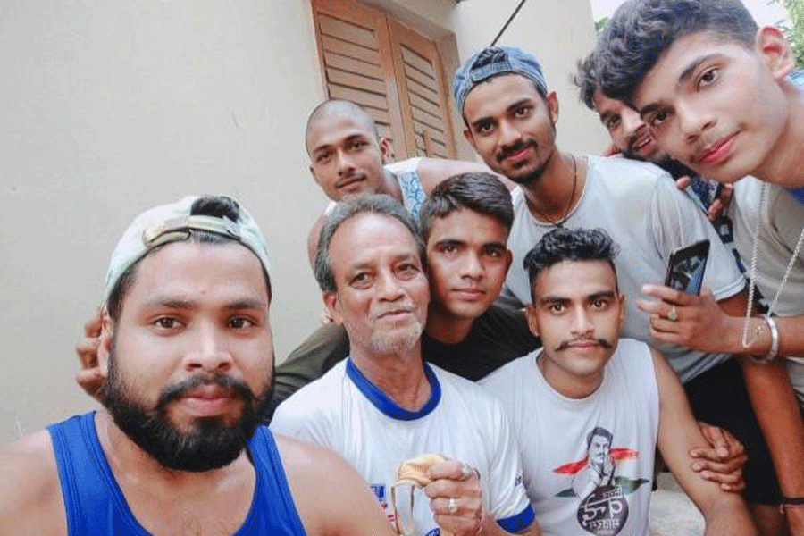 Prosit Ghosh of Paikpara with his young “fans”.