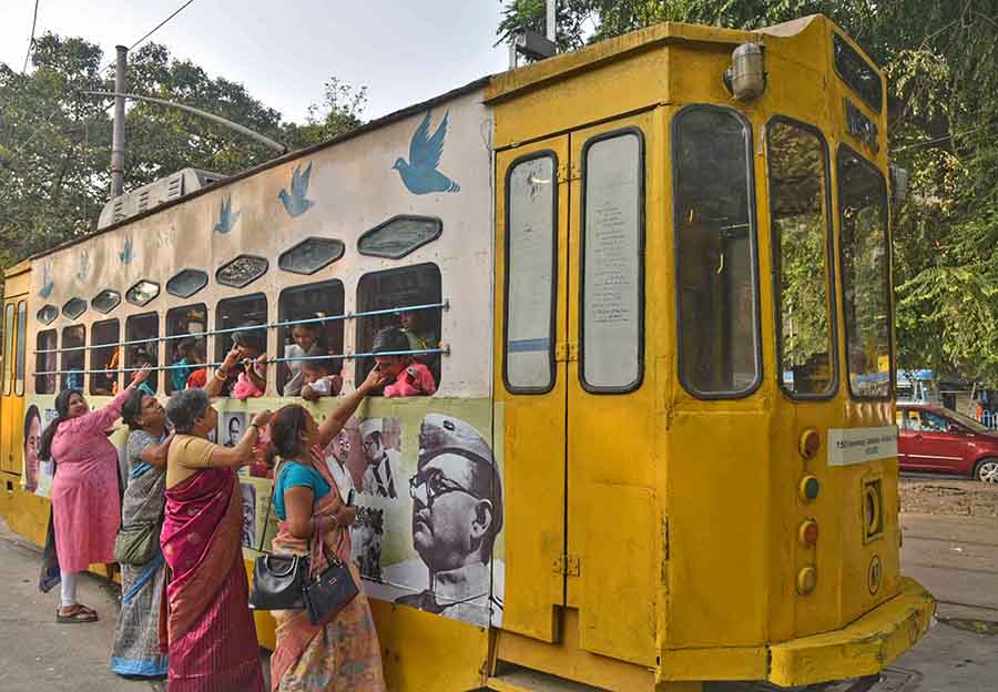 Acid attack survivors apply tilak to Thalassemia affected children on a tram at Dharmatala on ‘Protipad’ 