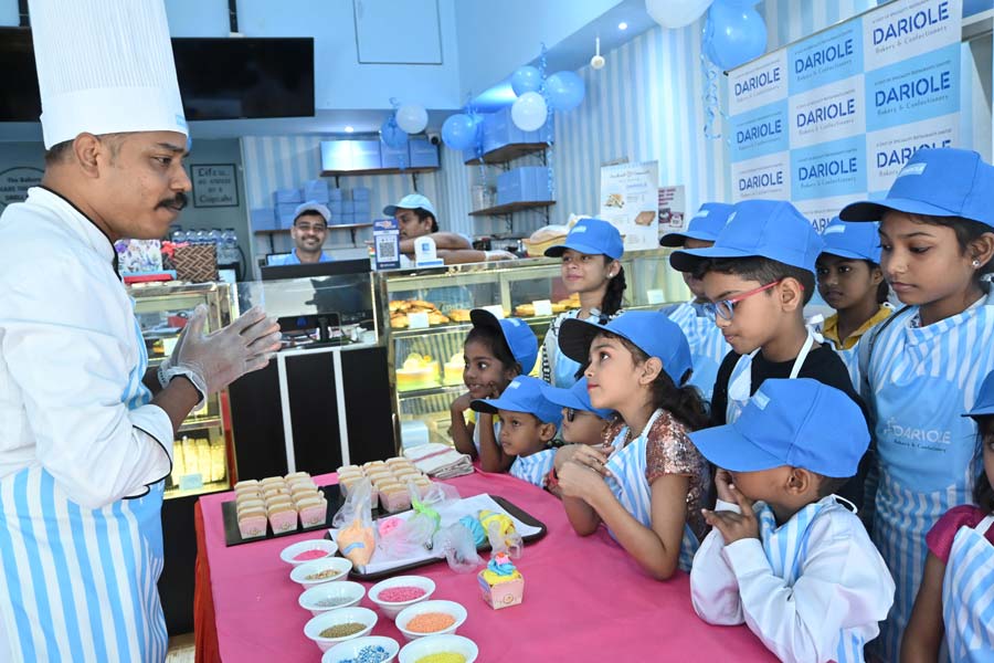 At Dariole Bakery & Confectionery on Shakespeare Sarani, 12 little bakers listen in rapt attention instructions to decorate cupcakes using their imagination and streak of creativity on Children’s Day on Tuesday