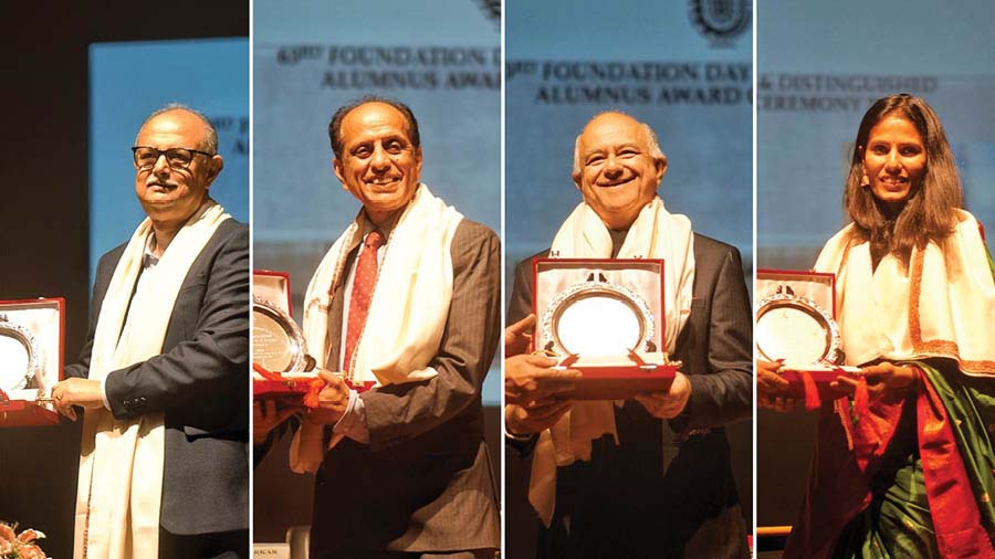 (From left) Subir Chakraborty, Narayanan Jayaraman, Prabhat K Bezboruah and Manjari Sharma receive the Distinguished Alumnus Award