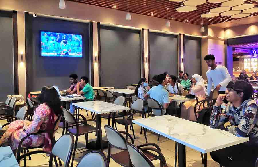 The food court of Forum Mall on Wednesday afternoon had people enjoying the match on the television 