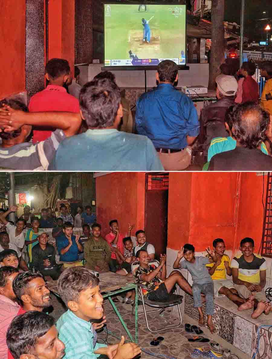  Cricket fans set up a giant screen on Anwar Shah Road in south Kolkata to enjoy the ICC World Cup semi-final between India and New Zealand on Wednesday   