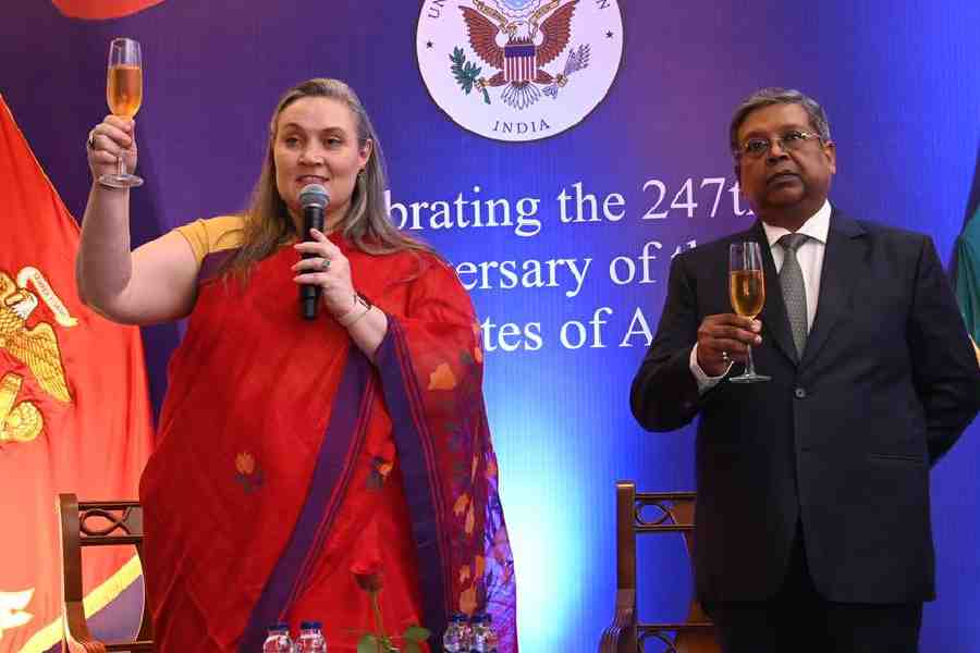Consul general Melinda Pavek raises a toast along with chief guest Barun Kumar Roy, additional chief secretary in charge of labour, at the reception at Oberoi Grand
