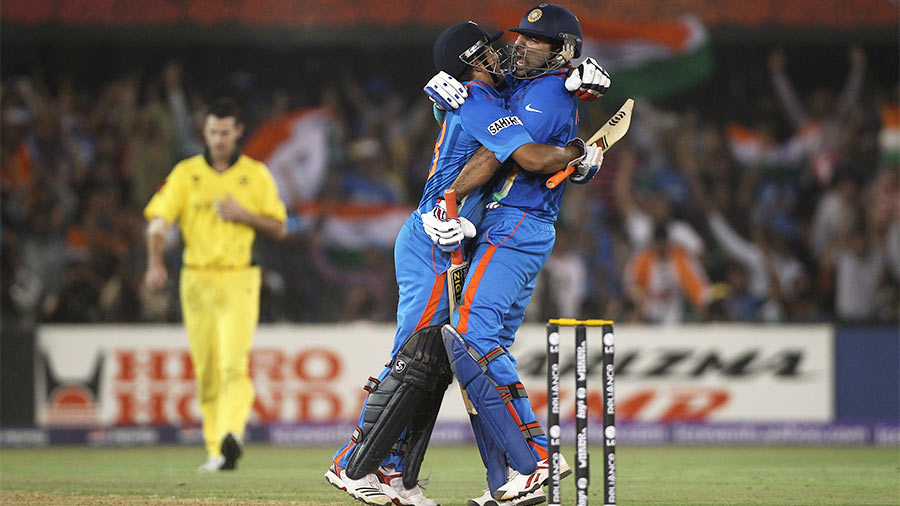 Suresh Raina and Yuvraj Singh celebrate as India knock Australia out of the 2011 World Cup in Ahmedabad