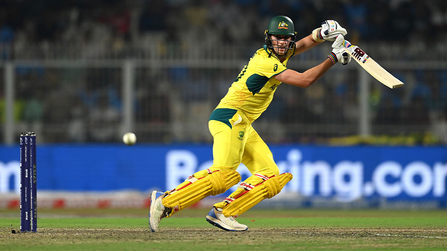 Cummins hit the winning runs as Australia crawled into the final with 16 balls to spare