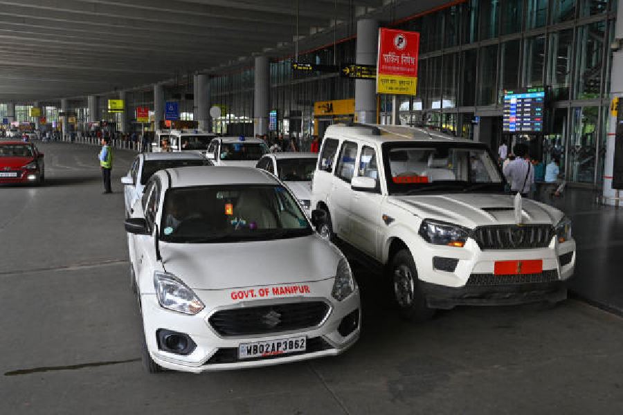Government and VIP vehicles parked in no-parking zones in front of arrival gates at the Kolkata airport on November 8