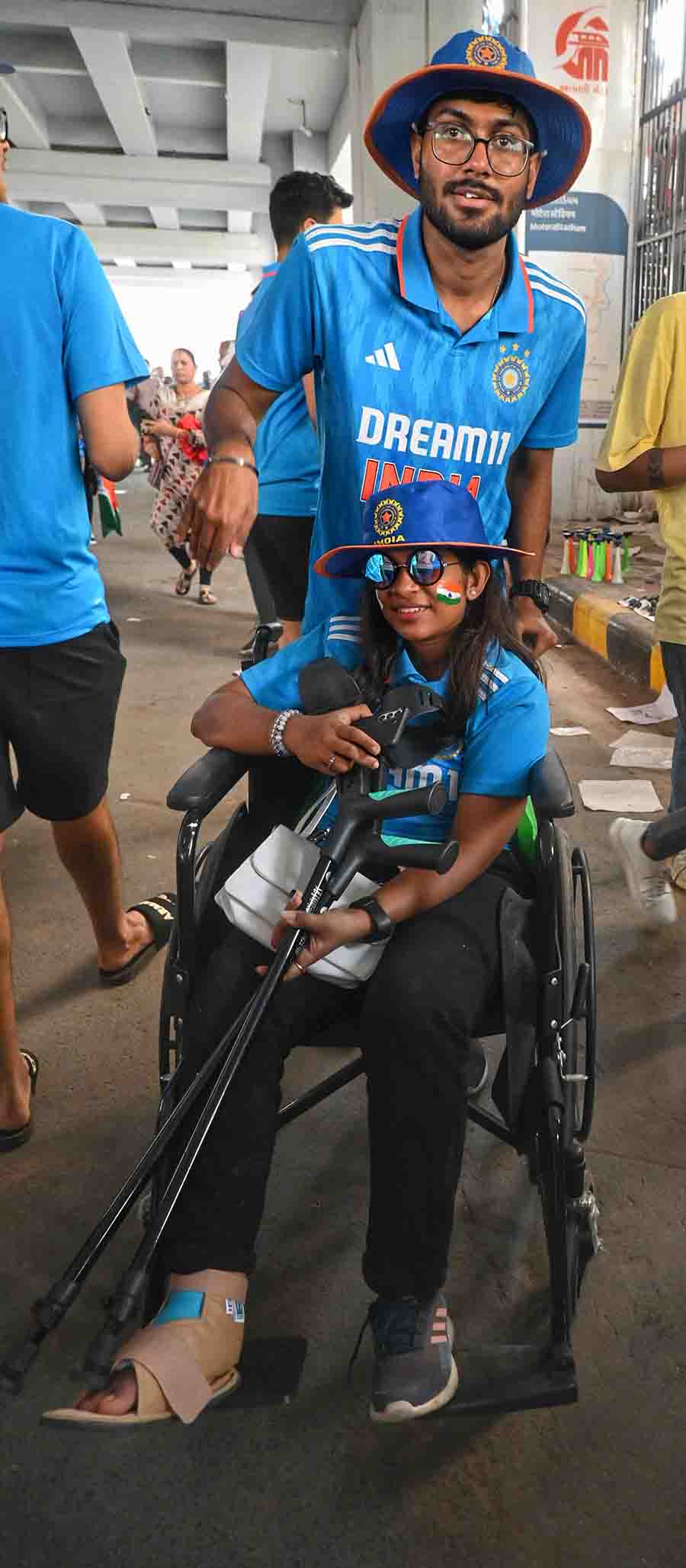 A fan turns up in a wheelchair with her spirit unwounded