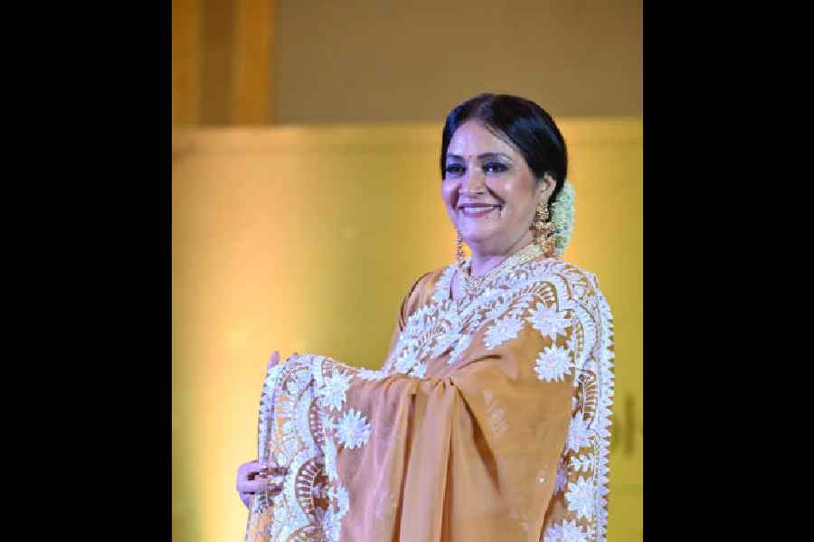 Dr Rupali Basu in a Manish Malhotra crepe with stone work and Kashmiri stitch