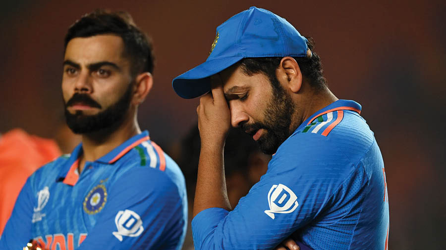 Virat Kohli and Rohit Sharma look distraught after Australia beat India to win the ICC Men’s Cricket World Cup in Ahmedabad on Sunday