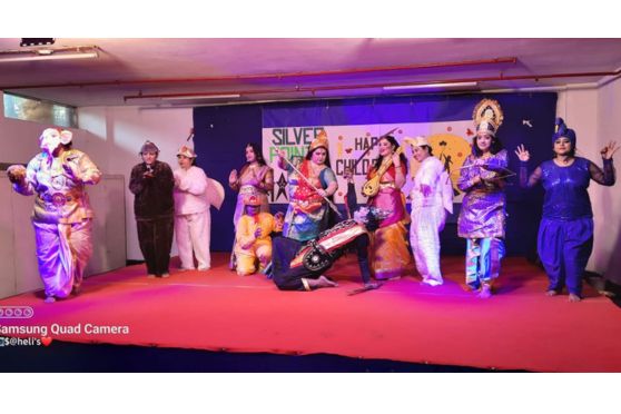The teachers of Silver Point School had put up a show "Silver Point Has Got Talent".Each group  had 3 minutes to showcase their talent. Their talent was evaluated by the esteemed judges - Bappi Subir Lahiri, Shilpa Keka Shetty and Kiran Babita Kher.(Teachers of SPS who has dressed up as Bappi da, Shilpa Shetty and Kiran Kher).The highlight of the show was our dear Principal ma'am 's performance, who had dressed up as Usha Uthub, the singing star of Kolkata.