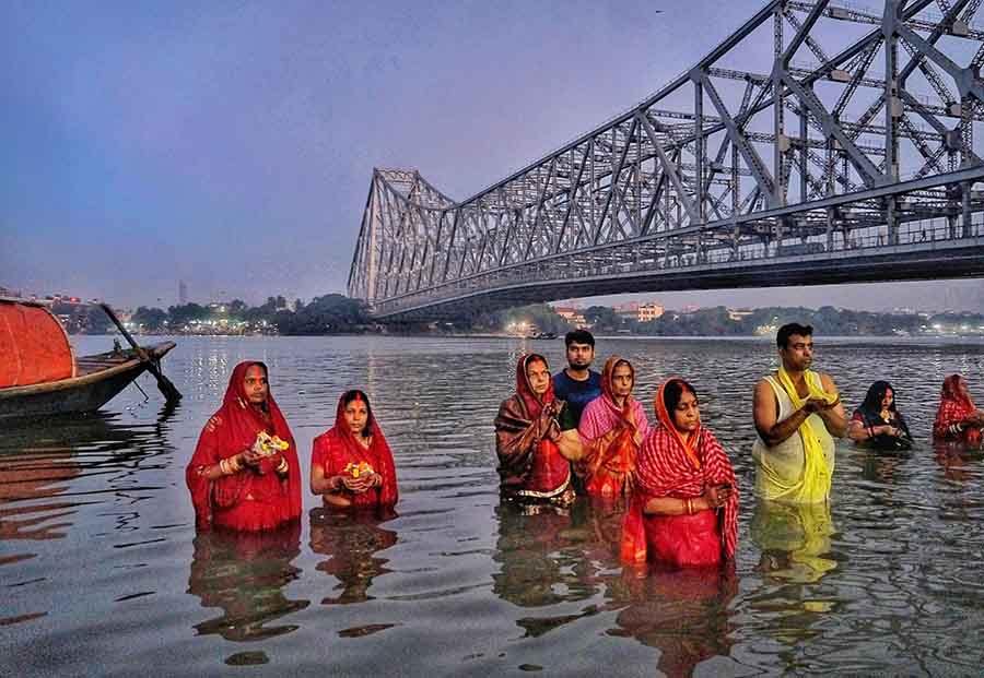 Devotees wait for the sun to rise at Jagannath Ghat