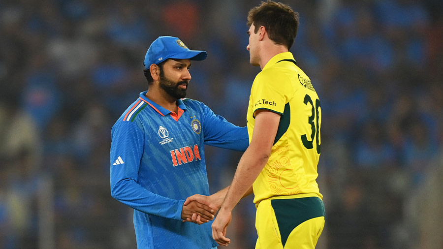 Rohit Sharma and Pat Cummins shake hands after leading their respective teams to memorable World Cup campaigns