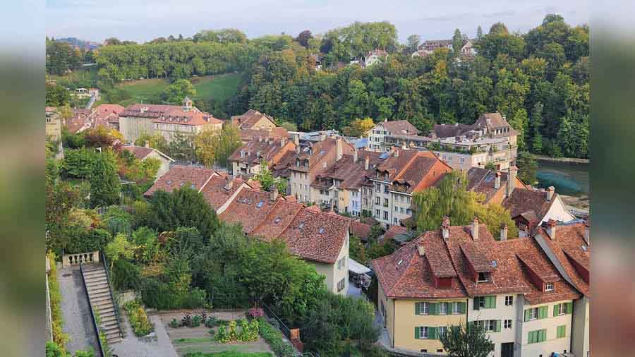 Most buildings in Bern maintain a quaint uniformity with their sloping red tiled roofs