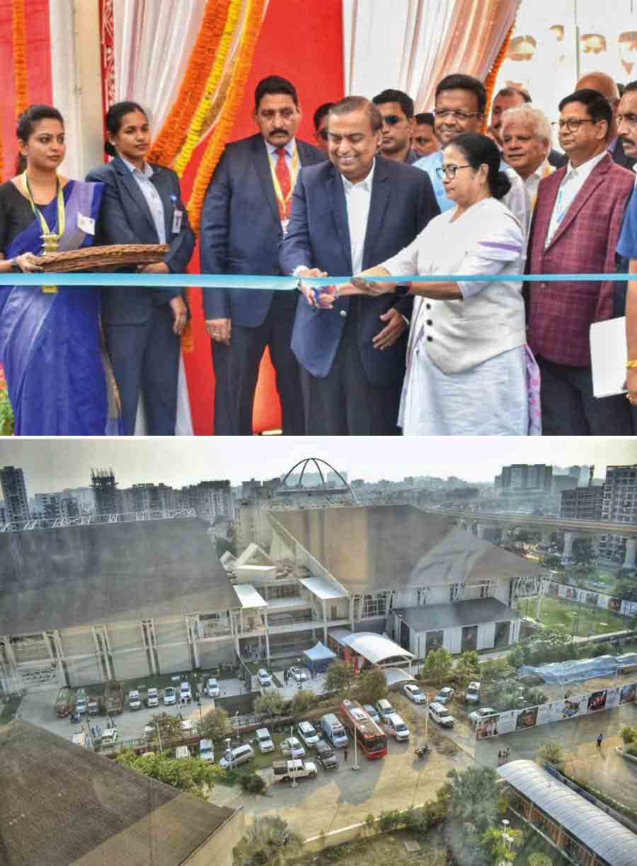 Industrialist Mukesh Ambani and other dignitaries assist chief minister Mamata Banerjee to inaugurate the annexe building of the Biswa Bangla Convention Centre during the Bengal Global Business Summit  in New Town on Tuesday