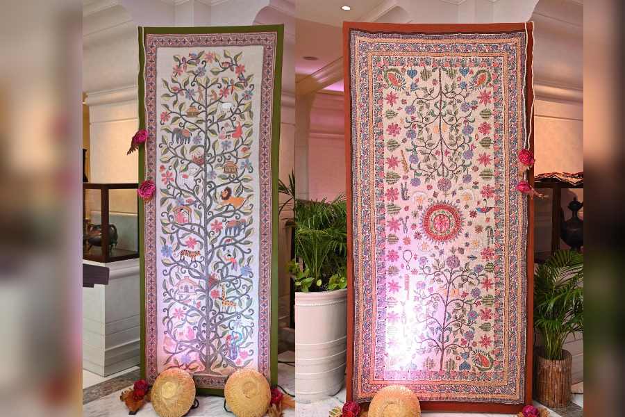 Both these panels depict The Tree of Life that signify prosperity, nourishment, sustenance and protection. These pieces are recreated from old designs, one with a mandala art motif in the centre and the other interspersed with animals, symbolising abundance and prosperity. 