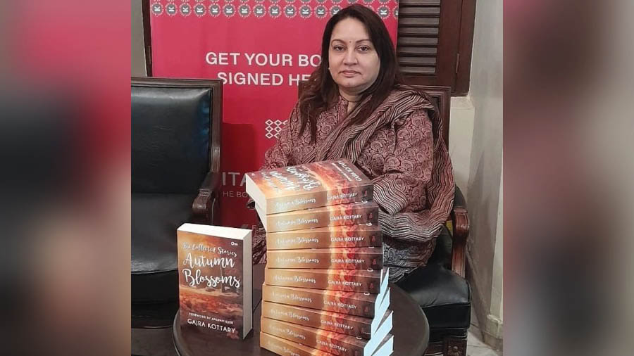 Kottary with copies of her book