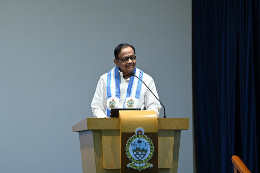 Former Union minister P. Chidambaram delivers his talk at St Xavier’s University on Saturday