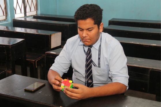 A contestant fixing the Rubik's Cube. 