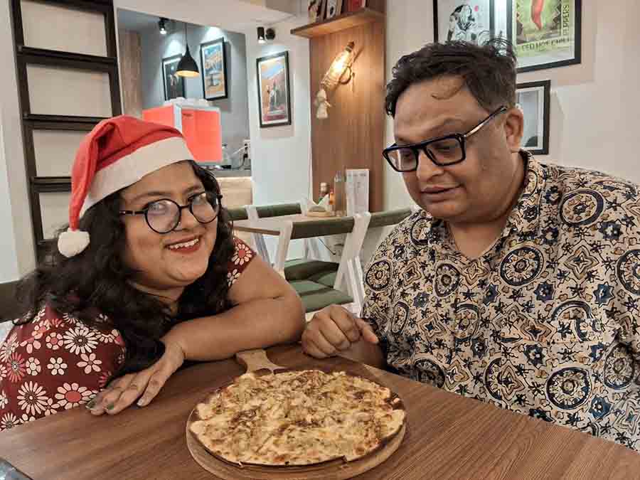 Prithvish Chakravarti, owner of Calcutta Deli & Stories and Tak Heng, enjoyed the special pizza 