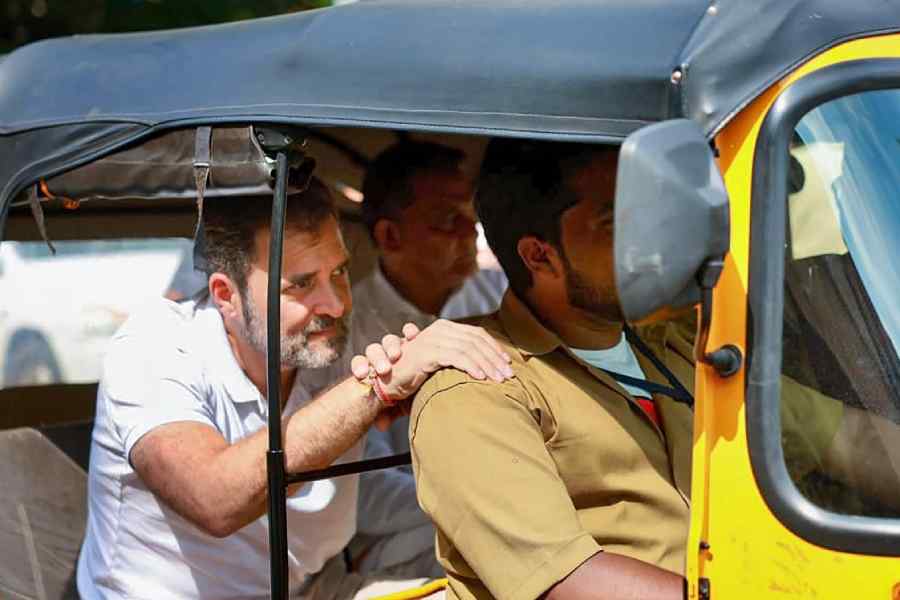 Congress leader Rahul Gandhi travels in an auto-rickshaw ahead of Telangana Assembly election, at Jubilee Hills in Hyderabad, Tuesday, Nov. 28, 2023.