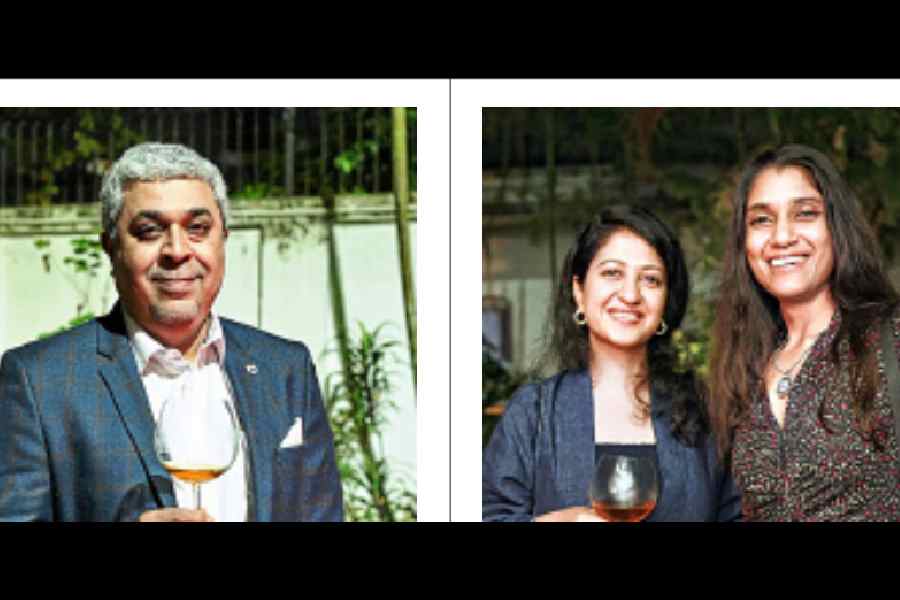 Anil Vaswani, past president, Calcutta Wine Club, (L-R) Amrita Saraogi and Surbhi Bajoria