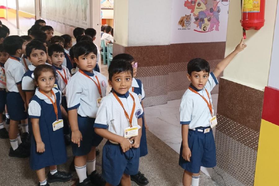 Students of Mahadevi Birla World Academy learn about a few safety features in school