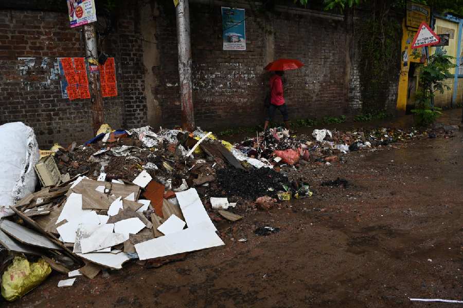 Construction waste strewn in front of KL Sen KG School on APC Road on September 21.