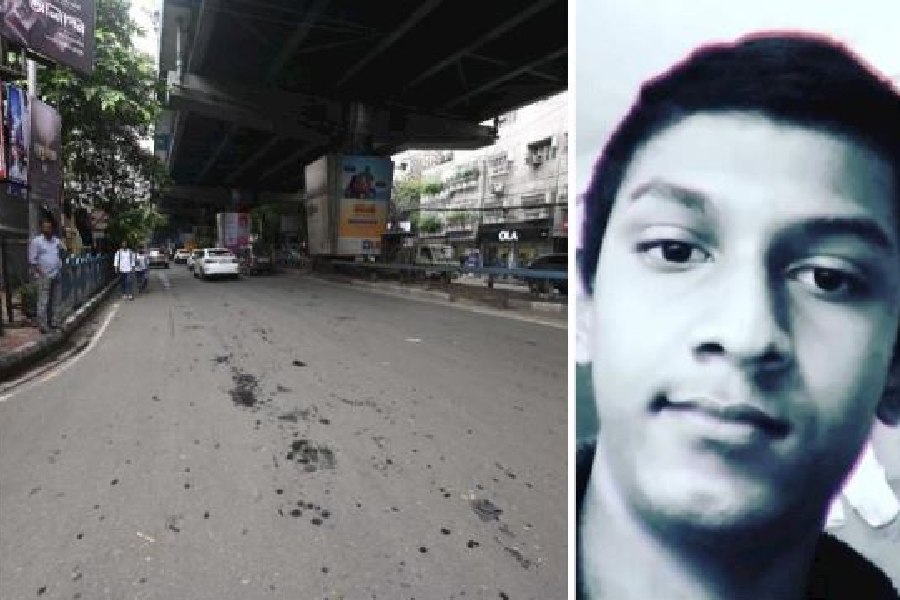 The spot on AJC Bose Road, at its crossing with Minto Park, where Arpan Bera (right) was found injured on Thursday morning
