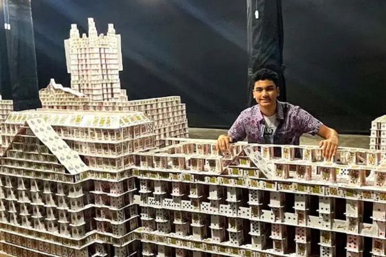 Arnav sits next to his amazing creation that got him into the Guinness Book of World Records