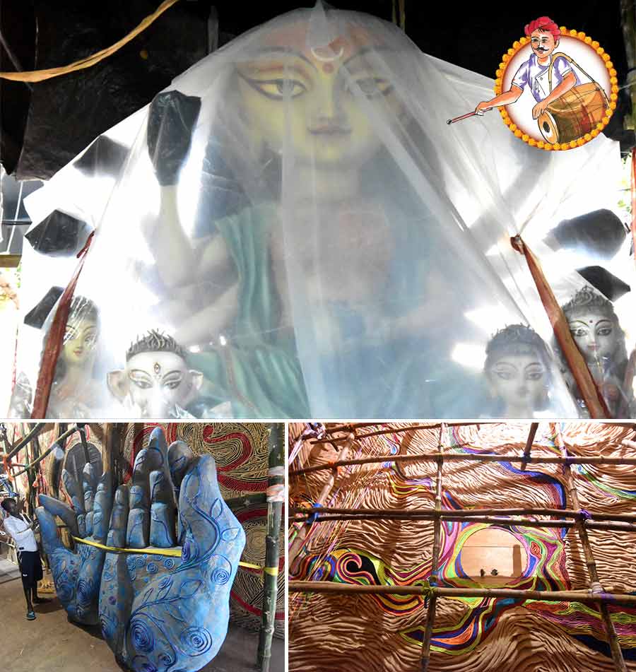The theme at Nalin Sarkar Street Sarbojonin Durgotsab in its 91st year is ‘Sambhabona’ (Possibility). Huge hands in the ‘mudra’ pose and made of coconut coir adorn the side panels. The brain behind the idea Shantanu Bhattacharya said: ‘When we pray to the goddess for everyone’s welfare but there remains a possibility of betterment’   